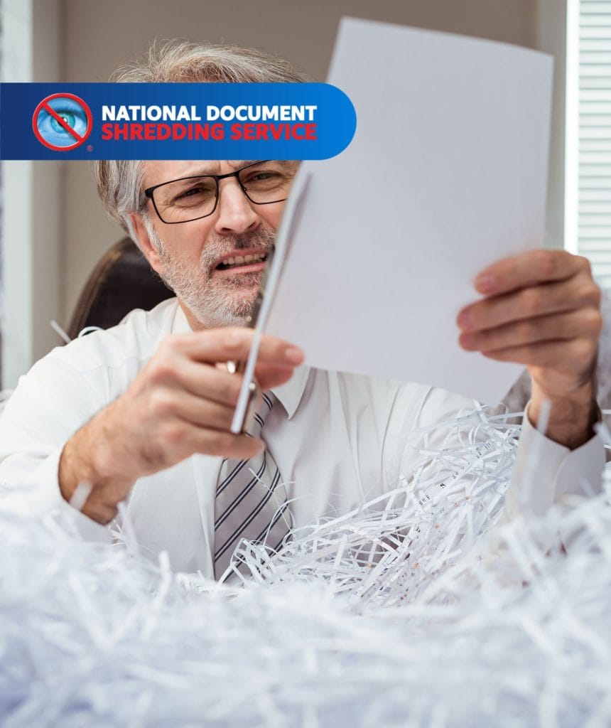 Customer using secure bin as part of a Document Retention and Destruction Policy for Financial Institutions to protect sensitive data.