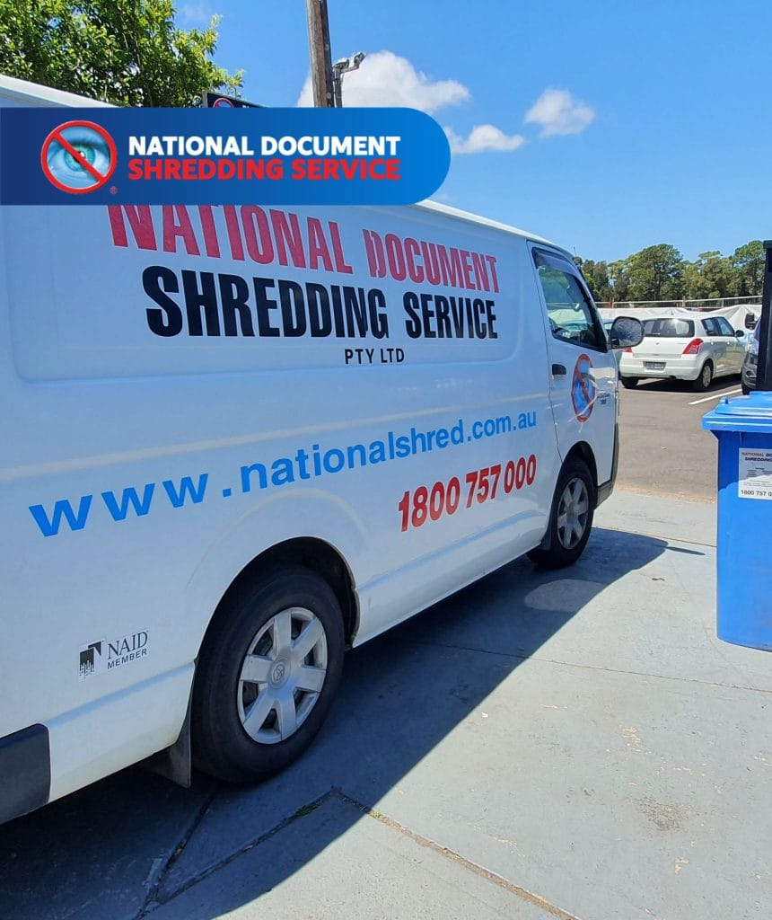Secure Drop-Off Shredding Service bin at facility entrance for safe disposal of confidential documents and records.
