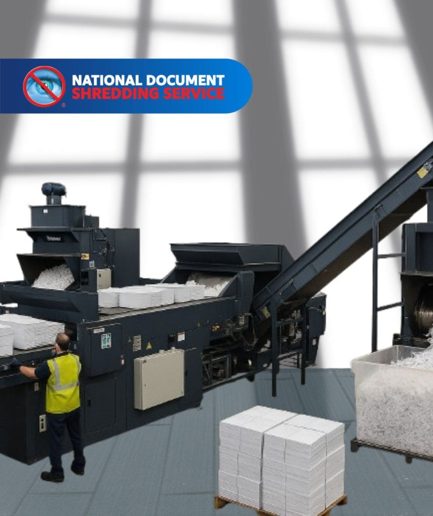 Industrial paper shredding process, securely destroying confidential documents to comply with Australian privacy laws.
